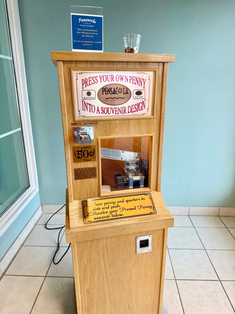 Pressed Penny Machine: Press your own penny into a souvenir design